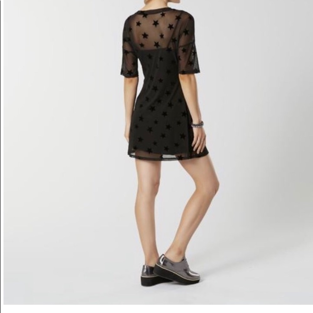 Cute😍slip dress with mesh star print overlay!